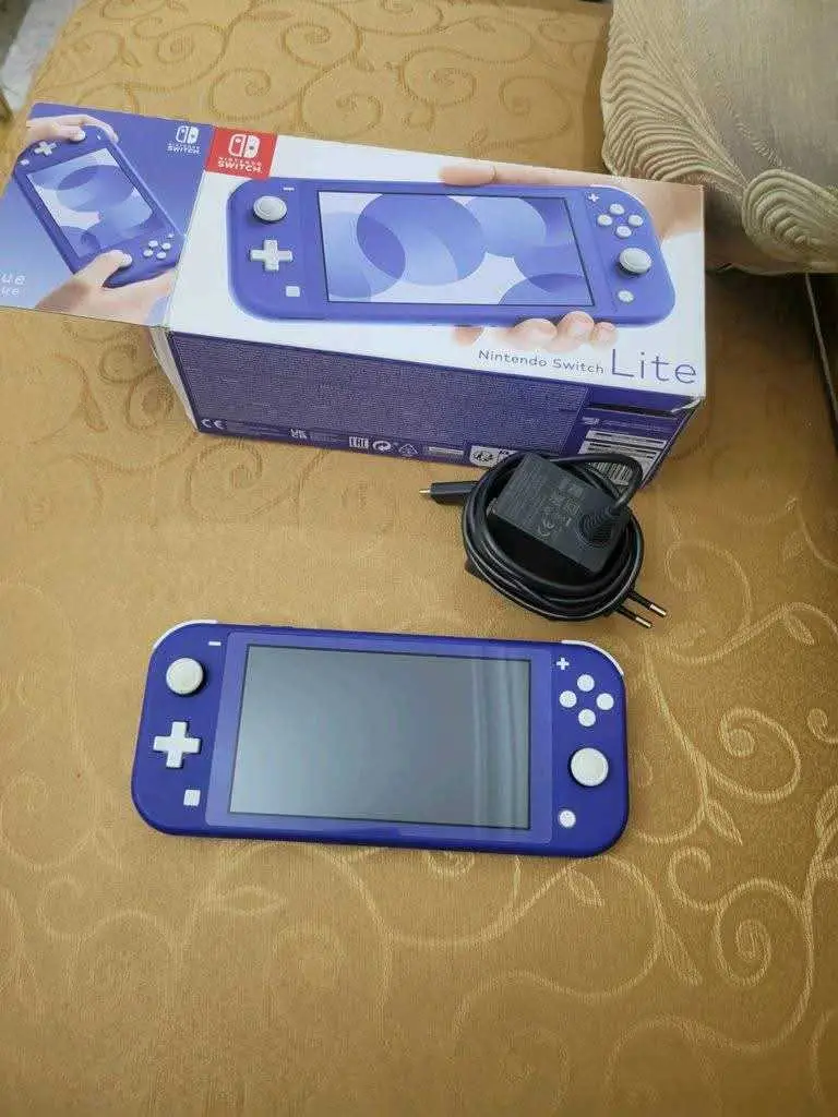  nintendo switch lite avec paquet et chargeur dorigine à Manouba - Photo 3