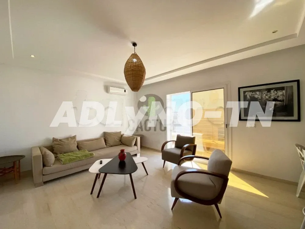  À Vendre – Appartement S+2 en Rez-de-Chaussée avec Vue sur Jardin 