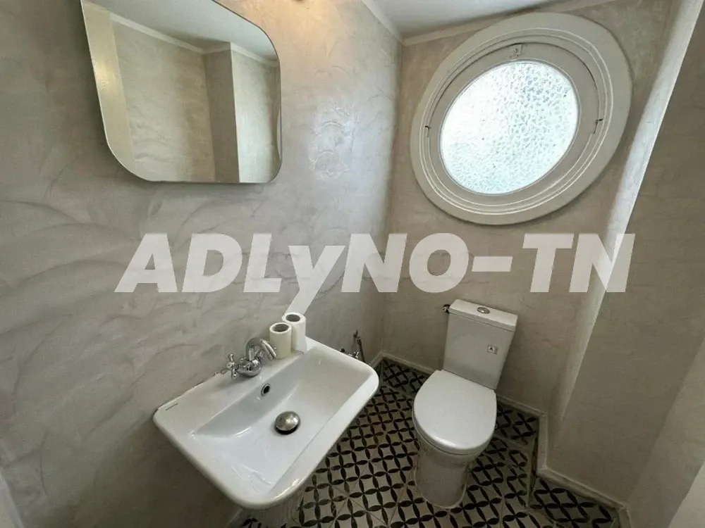 Villa plain-pied semi meublée avec un grand jardin à Mutuelleville à Tunis - Photo 5