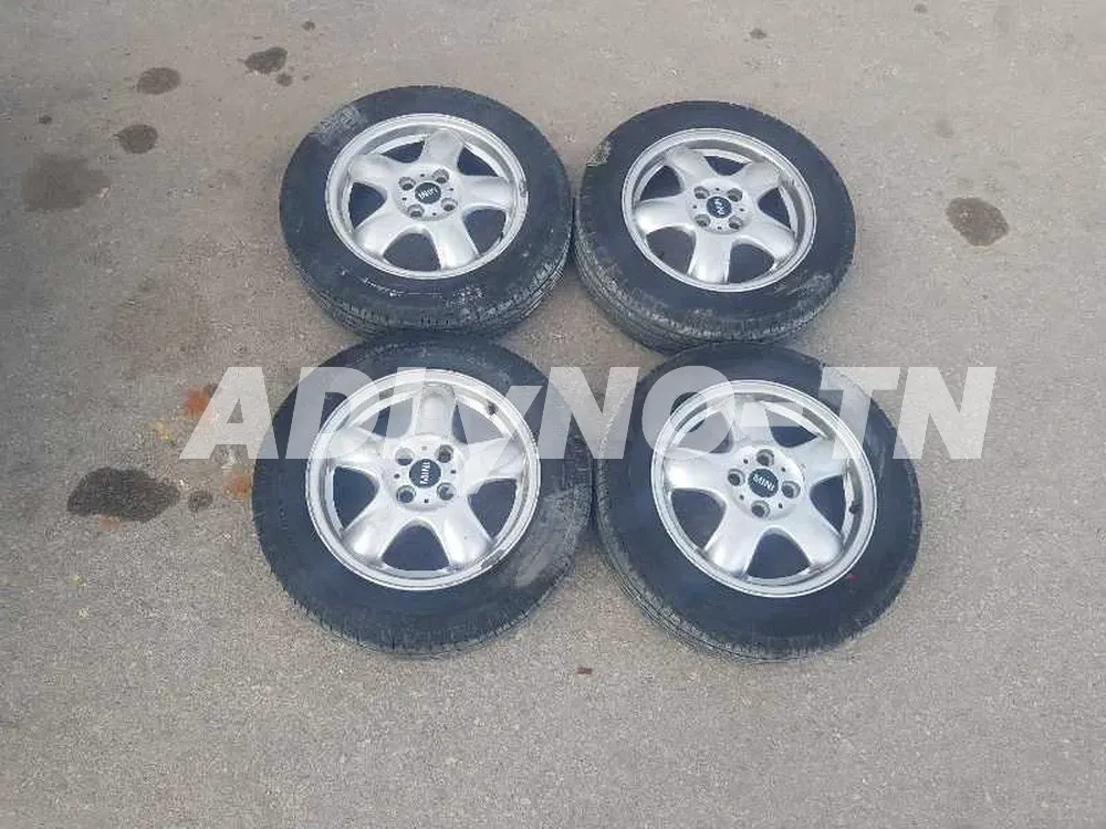 4 jeunes mini cooper par 15 avec pneus neufs 1200 25254848 à Ariana - Photo 1
