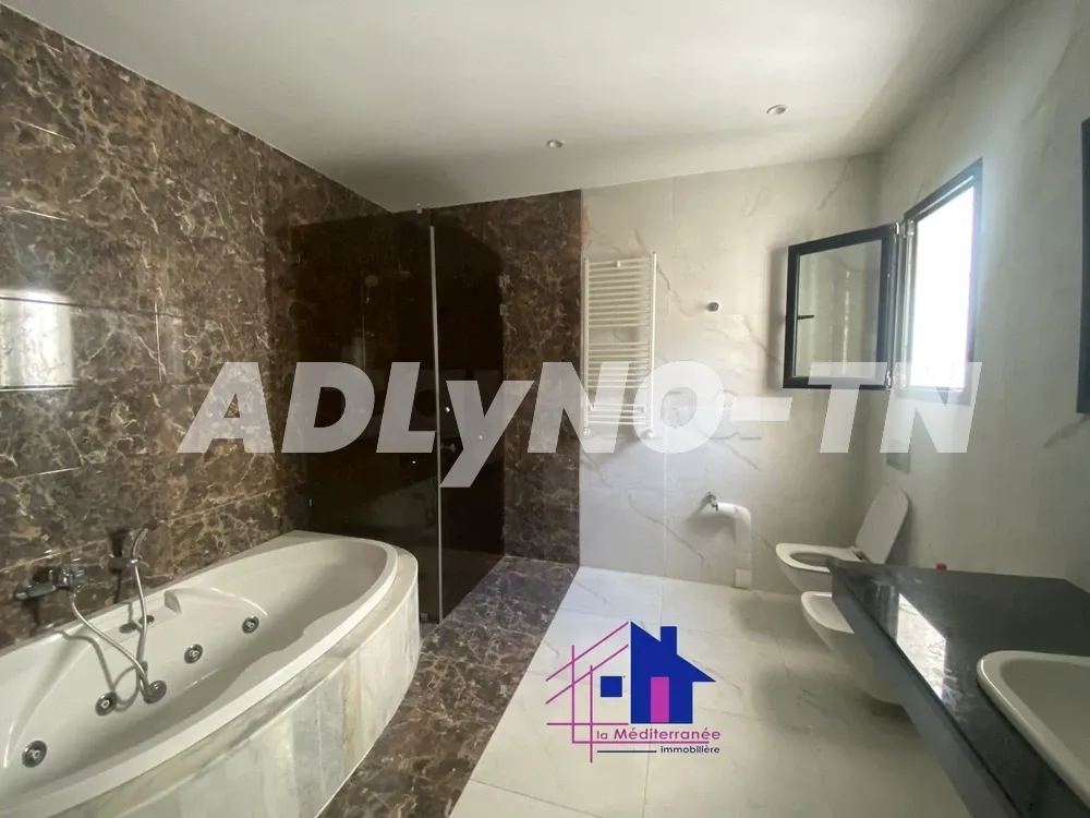 Une superbe Villa S+7 avec piscine à la marsa cube à Tunis - Photo 8