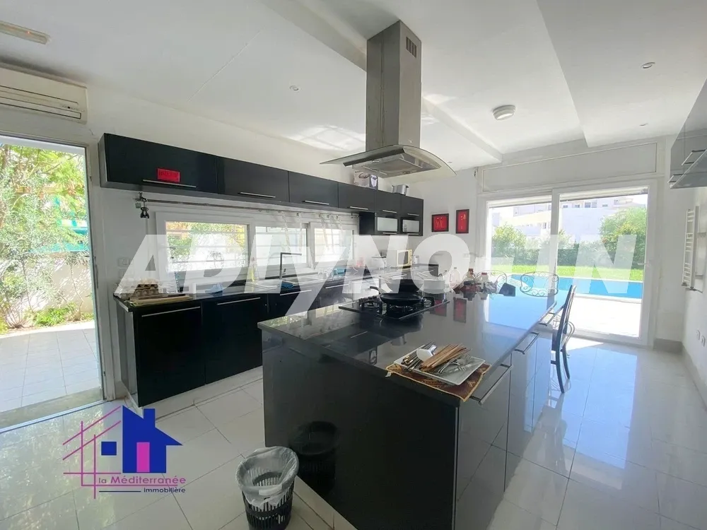 Une superbe villa semi meublée S+4 avec jardin et piscine au lac 2 à Tunis - Photo 3