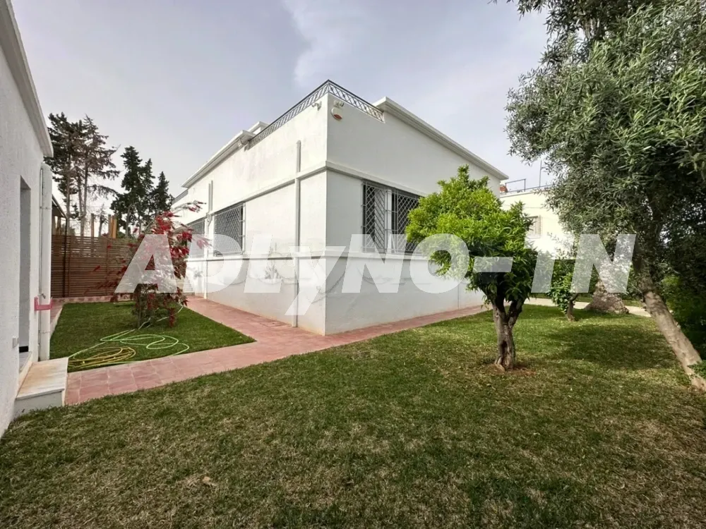 Villa plain-pied semi meublée avec un grand jardin à Mutuelleville à Tunis - Photo 8