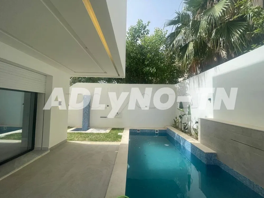 Une villa S+3 à la Soukra à Ariana - Photo 4