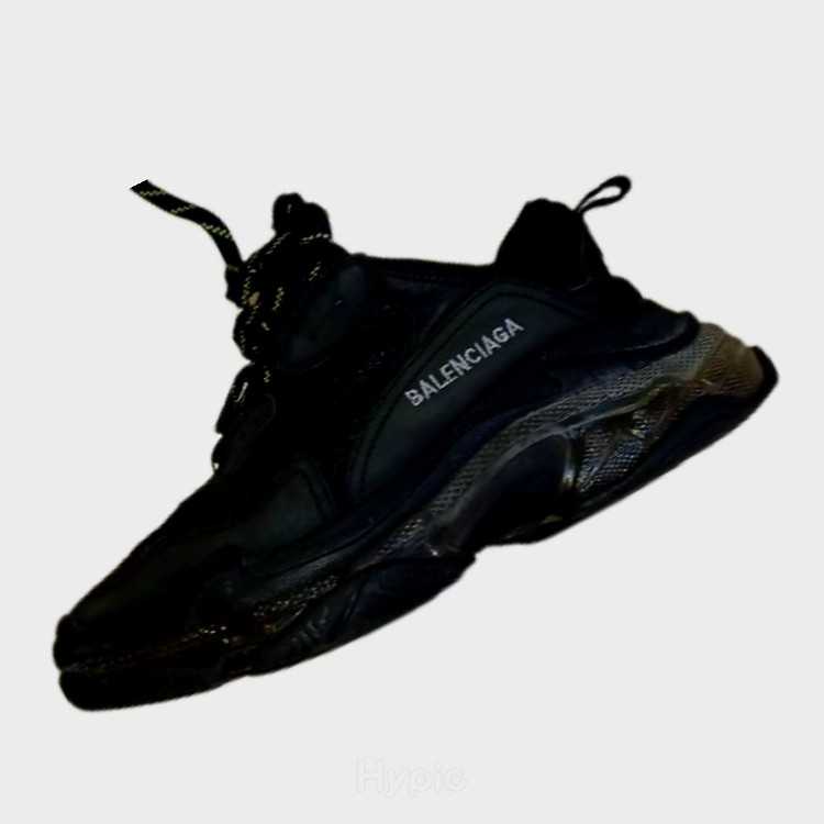 Balenciaga triple s cloth trainers.