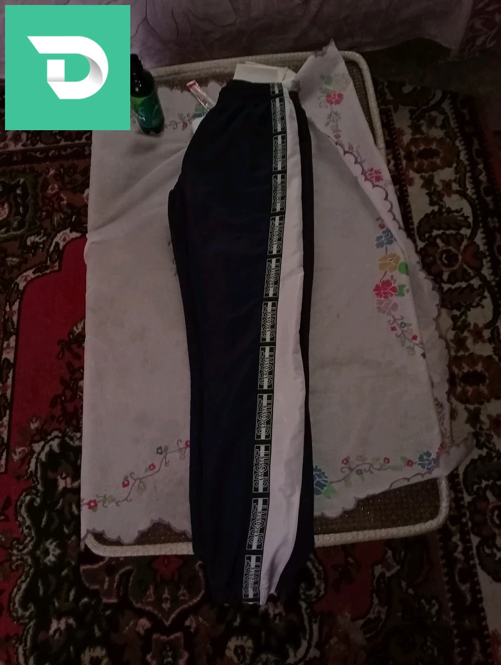 سروال لاكوست طاي5 ملبوس 