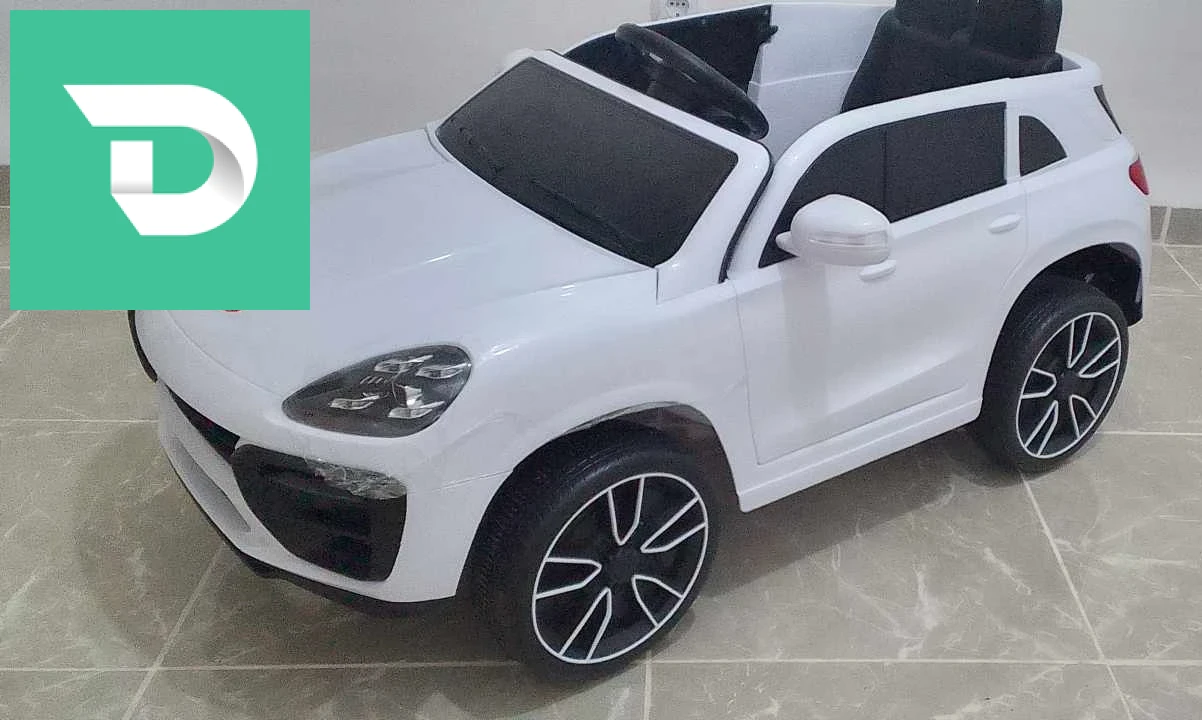 Voiture électrique NEUF blanc PORCSH avec telecommande avec chargeur سيارة اطفال جديدة كهربائية. ... 